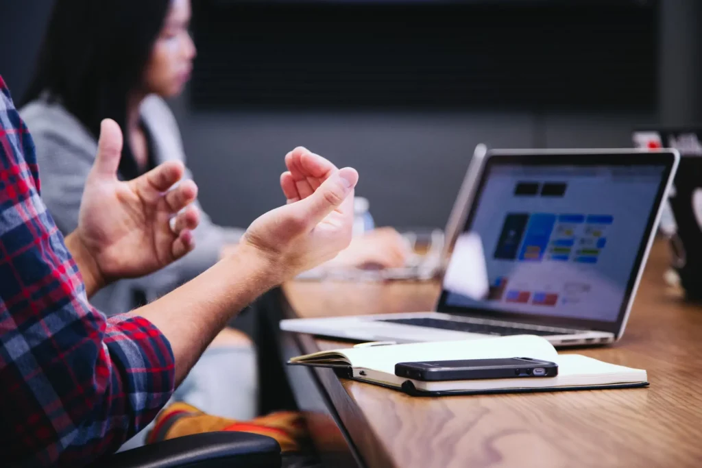 Man making point during meeting recruitment discussion | Computappoint